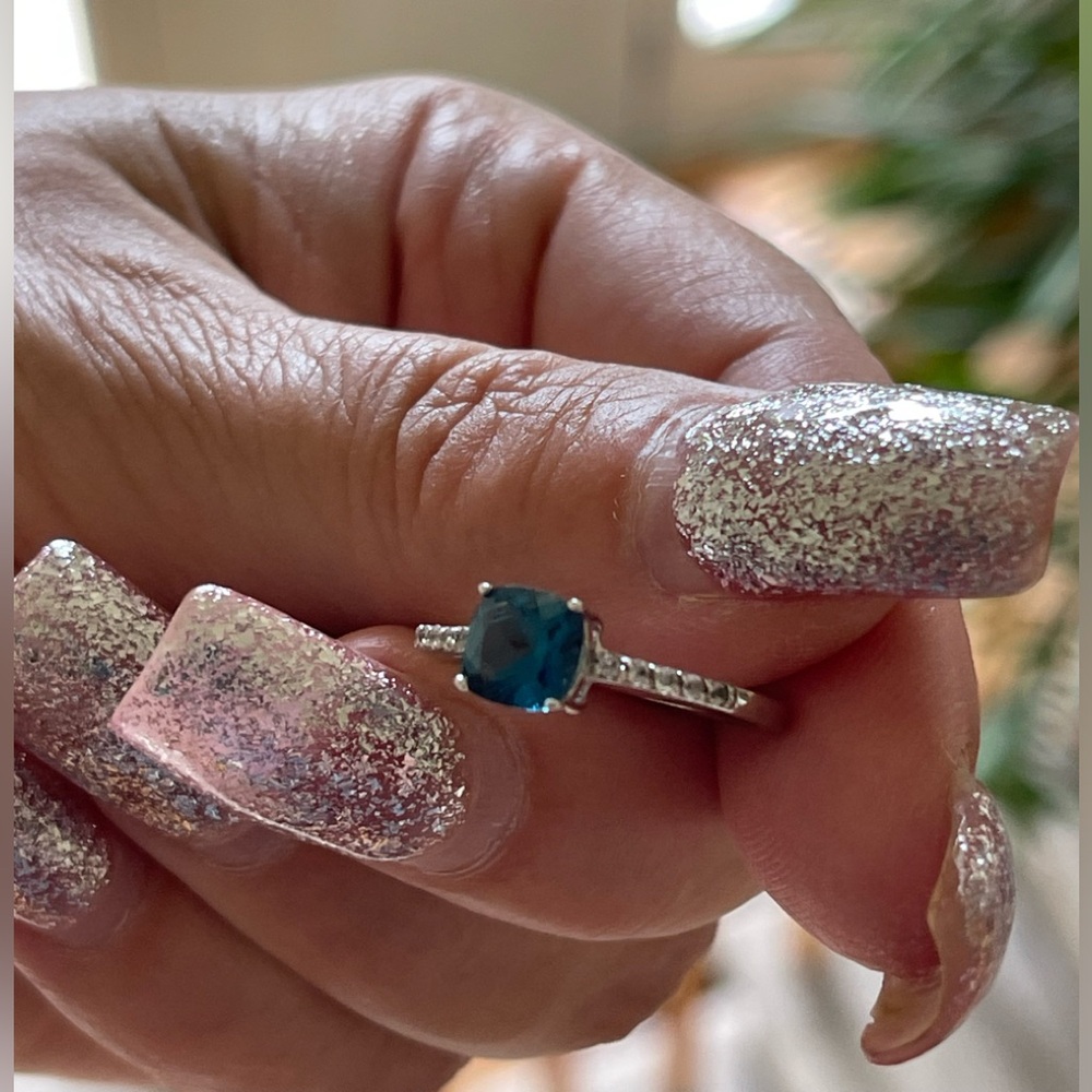 Woman’s white gold London blue topez  ring size 7
